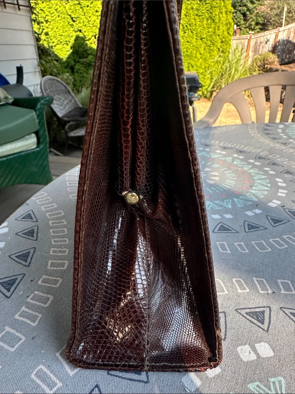 Women’s lizard skin mid century bag